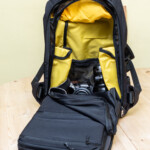 The space for your laptop and other slim items forms the side of the backpack that rests against the wearer's back and folds down when the bag is opened, revealing the rest of the bag's main innards.